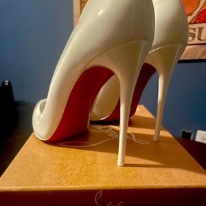 Christian Louboutin
Hot Chick Patent Leather Pumps